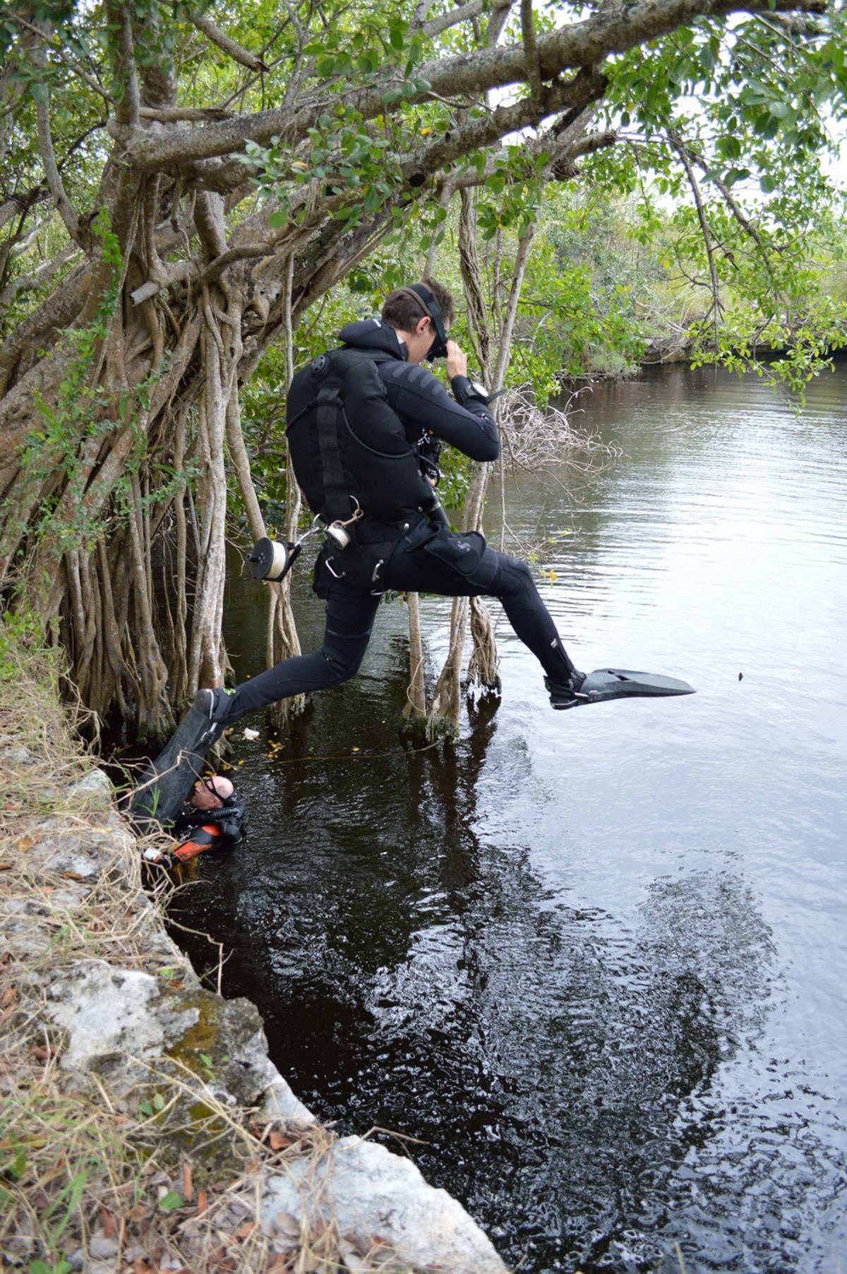 Divers (David Brankovits and Tom Iliffe) entering a cenote in the Yucatan Peninsula
(c) Sergio Benitez